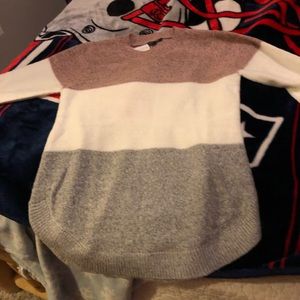Sweater. Pink white and grey. Size large. Never worn.